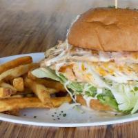 Reel Fish Sandwich · Traditional made with grilled Cobia, lettuce, tomato, cabbage. Choose your sauce, or pick an...
