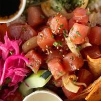 Poke Bowl · Only the freshest tuna poke, seasoned rice, chips, and greens.