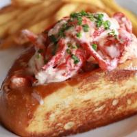 Lobster Roll · Lobster Meat, served warm, in a split top NE Roll, tossed lightly in drawn butter, mayo, & l...