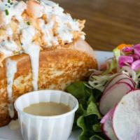 Lobster Grinder · Chilled Lobster, Shrimp, Spiced Aioli, Packed into a split-top butter roll.