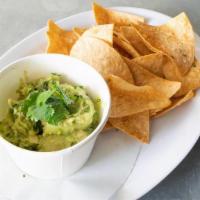 Guac & Chips · 2oz of guac & a side of chips