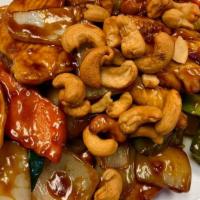 Cashew Nut Chicken · Sliced white meat chicken sauteed with cashew nuts, green peppers, carrots, onions and zucch...