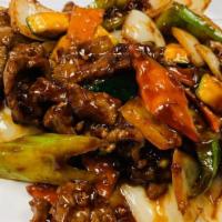 Szechuan Beef · Sauteed tender beef with celery, dry chili peppers, green peppers, onions, zucchini and carr...