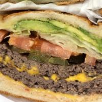 Avocado Cheeseburger Combo · Served on a sesame seed bun with thousand island sauce fresh leaf lettuce tomato sweet red o...