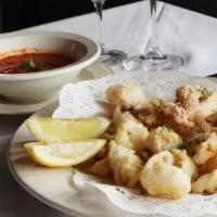 Calamari Fritti · Tender squid lightly fried, served with marinara dipping sauce.