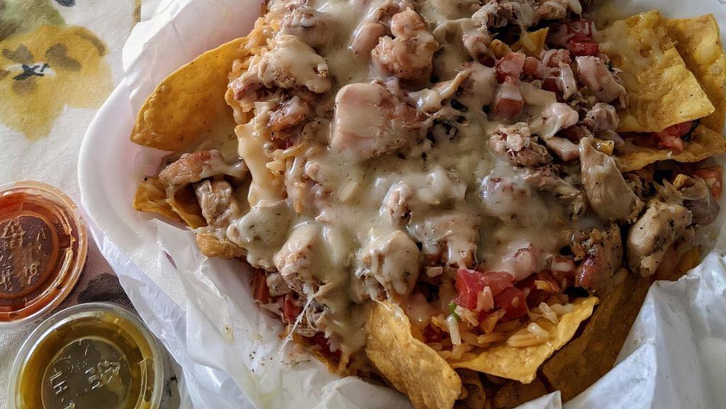Nachos Chips Cheese Guacamole And Meat · Chips cheese guacamole and meat