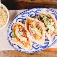 Tacos Tres Amigos (3) · Sautéed shrimp, carne asada and lobster taco cheese crisp, pico de gallo, sliced avocado, co...