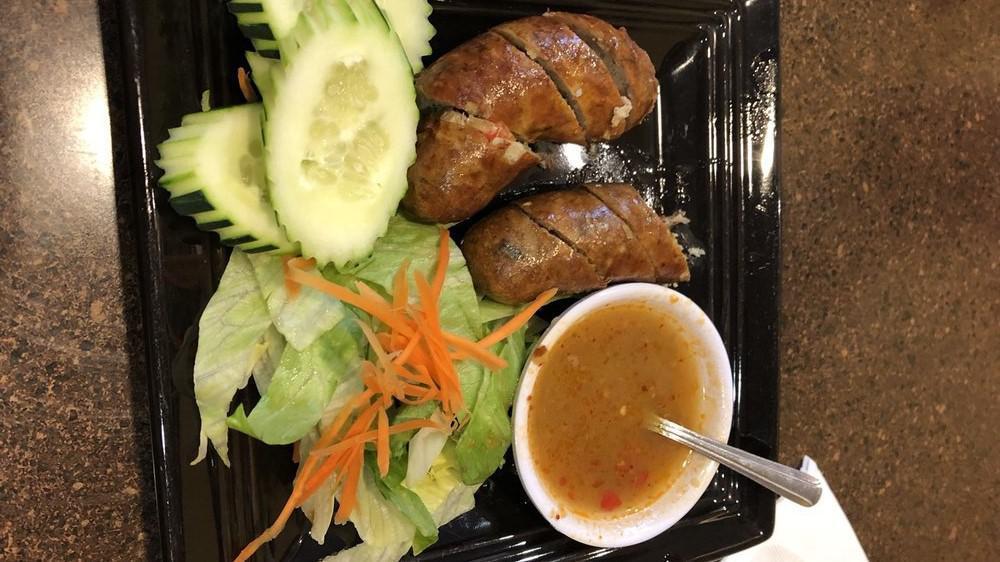 Lao Sausage (2 Pieces) · Halal. Chicken with lemongrass and lime kaffir lime leaves.