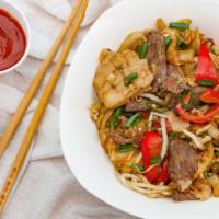 Pad Kee Mao (Drunken Noodles) · Halal. Choice of vegetarian or meat stir fried wide rice noodles with bell peppers, onions, ...