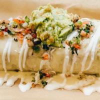 John Daly Burrito · Burrito filled with choice of meat, Beans, Rice, and Cheese. Dripping with Nacho Cheese, Sou...