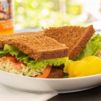 Cashew Chicken Salad Sandwich · Home-made Chicken Salad on squaw bread topped with cashews.

Choice of lettuce, tomato, onion