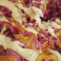 Pastrami Fries · Melted cheddar and thousand island.