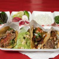 Tacos · Tijuana style Tacos with your choice of meat ASADA ,ADOBADA ,BIRRIA, POLLO and choice of ad ...