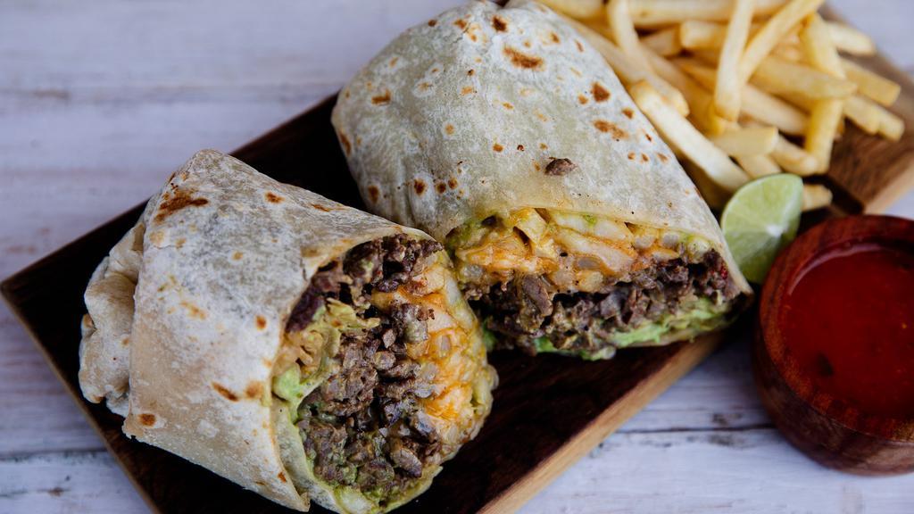 California Burrito · a 14 inch flour tortilla filled with your choice of meat accompanied with fries sour cream mixed cheese salsa and guacamole