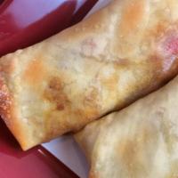 Egg Rolls (4 Rolls) · Choose from pork, chicken or vegetable. Crispy deep-fried egg rolls stuffed with your choice...