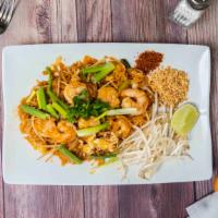 Pad Thai Noodles · Thin rice noodles with green onions, bean sprouts, & eggs topped with crush roasted peanut.