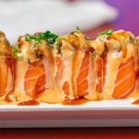 Salmon Slider · Spicy crab meat wrapped in salmon, D.F. asparagus, green onion, black tobiko, & chili