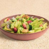 Fattoush Salad · Romaine lettuce, tomatoes, cucumber, green pepper, pita chips, fattoush dressing