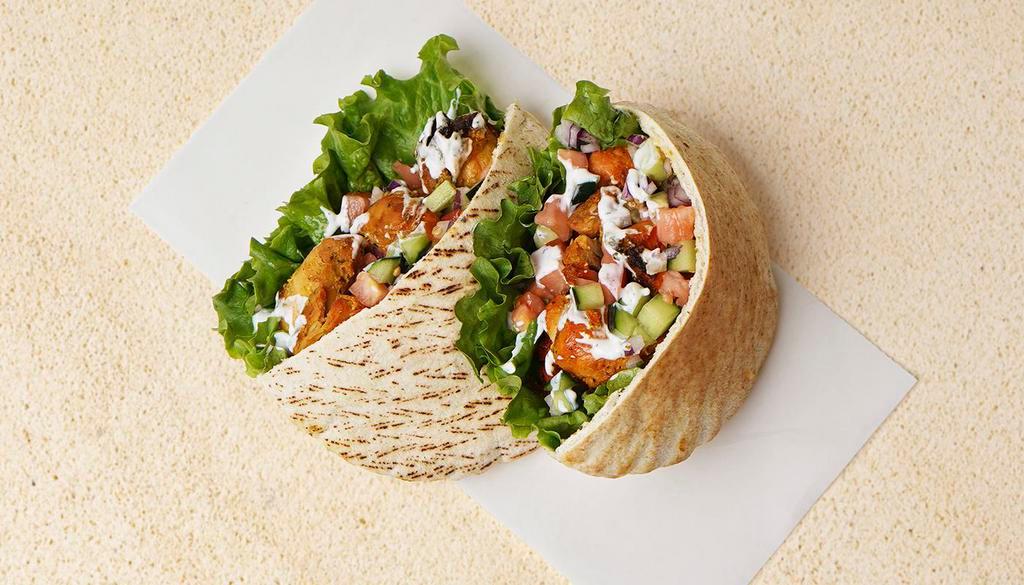 Chicken Kabob Pita Sandwich · Wrapped in a pita with lettuce, cucumber, tomato, and your choice of sauce.