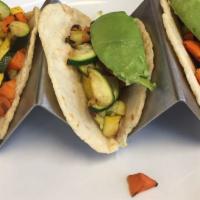 Vegan Tacos · Corn or flour tortillas, black beans, corn, red onions, grilled cactus, bell peppers, cilant...