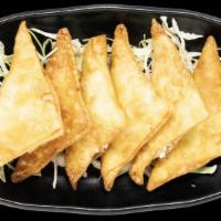 Crab Rangoons · (6 pcs) Crispy wonton wrapped with crab and cream cheese filling. Served with house made swe...