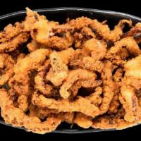 Geso Fry · Fried squid legs. Served with a slice of lemon and house made spicy mayo dipping sauce.