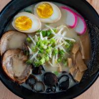 Tonkotsu Ramen · Pork and chicken broth base.
Toppings: roasted pork, boiled egg, kikurage mushrooms, bamboo ...