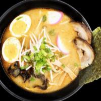 Shoyu Ramen · Soy sauce soup base. Toppings: roasted pork, boiled egg, kikurage mushrooms, bamboo shoots, ...