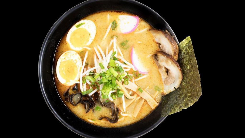 Shoyu Ramen · Soy sauce soup base. Toppings: roasted pork, boiled egg, kikurage mushrooms, bamboo shoots, green onions, sprouts, fish cake, seaweed.