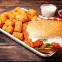 Buffalo Chicken Sandwich Combo · crispy breaded chicken tossed in buffalo sauce, with ranch and pickles on a toasted sesame b...