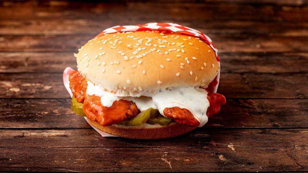 Buffalo Chicken Sandwich · crispy breaded chicken tossed in buffalo sauce, with ranch and pickles on a toasted sesame bun
