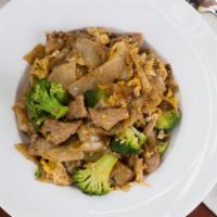 Pad See You · Flat noodles with egg, broccoli, and sweet black sauce.