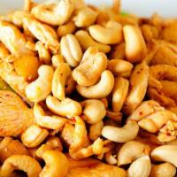 Cashew Nut Chicken · Stir-fried water chestnuts in chili paste topped with cashew nuts.