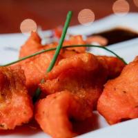 Amritsari Fish · Fish dipped in a special batter and fried to golden perfection