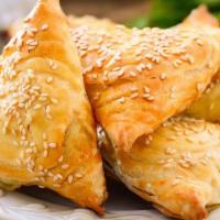 Lamb Samosa · Turnover stuffed with minced meat and spices, deep-fried