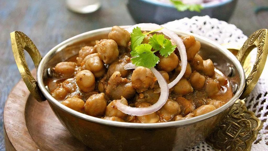 Peshwari Channa · Peshawari Chana is a great Punjabi treat made with boiled chickpeas with pure ghee and Indian spices.