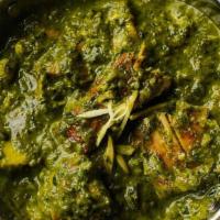 Chicken Saag Masala · Boneless chicken cooked with spinach in a mild sauce.