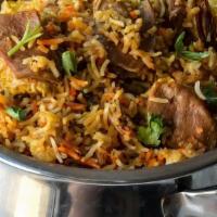 Lamb Biryani · Basmati rice cooked with cubes of boneless lamb, cashew nuts and raisins