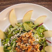 The Fuji Salad · Mixed greens, caramelized walnuts, bleu cheese crumbles, fuji apples, tossed in glazed balsa...