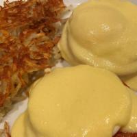 Eggs Benedict · Canadian bacon and two poached eggs on an English muffin with hollandaise sauce.