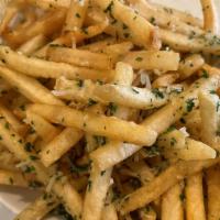 Truffle Fries · Skinny fries topped with truffle oil, parmesan cheese and parsley.