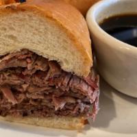 French Dip · Hot roast beef or beef brisket on a French roll With au jus.