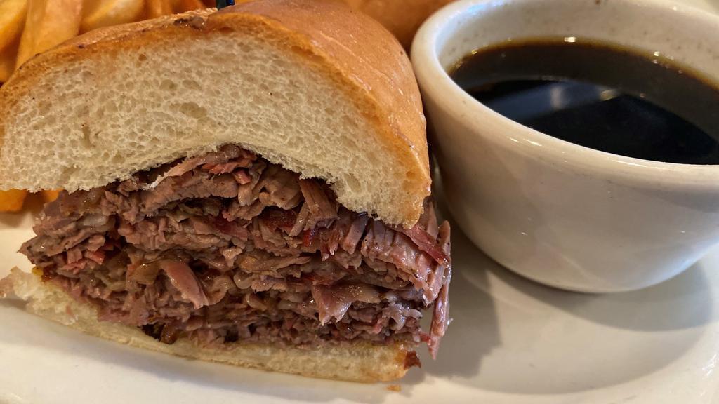 French Dip · Hot roast beef or beef brisket on a French roll With au jus.