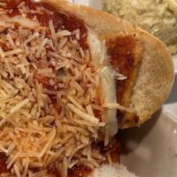 Chicken Parmesan · Breaded chicken breast topped With homemade marinara, parmesan and mozzarella cheese on a Fr...