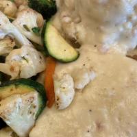 Chicken Fried Steak · Served with mashed potatoes, grilled vegetables and country gravy.