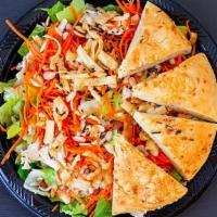 Asian Chicken Salad · Romaine lettuce, grilled chicken breast, carrots, sesame seeds, wonton strips, toasted almon...