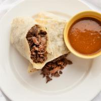 All Meat Burrito · Pressed flour tortilla filled with your choice of meat, salsa, onions, and cilantro.
