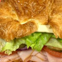 #4. Croissant With Turkey & Cheese · Turkey, cheese, lettuce, tomato, pickles, onion, mayo, mustard