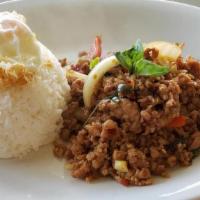 Pad Ka Prow Kai Dow Over Rice · Spicy. Stir fried Thai chili garlic with your choice ground chicken or pork with fresh basil...