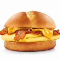 Brioche Breakfast Sandwich · Fluffy Egg and Melted American Cheese on a soft Brioche Bun with your choice of  sausage or ...